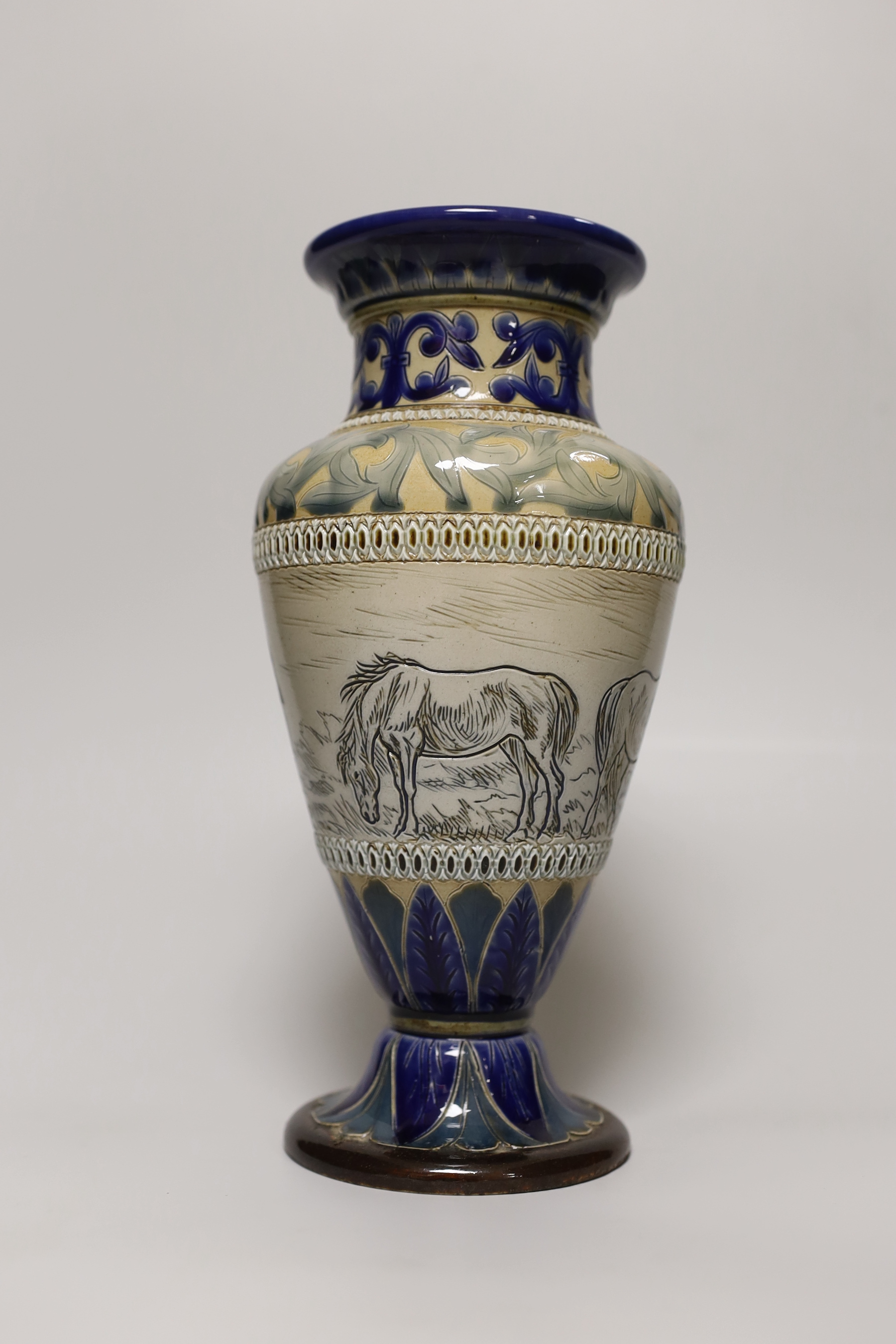 A Hannah Barlow Doulton Lambeth stoneware vase, decorated with horses, stamped and numbered 1883 to the base, 27cm high